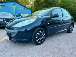 Peugeot 206 + 1.1l essence 60cv finition trendy 120.200kms 12/2009 direction assistée fermeture centralisée vitres électrique