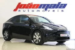 Tesla Model Y ...