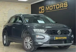 1° Main Garantie 12 mois Volkswagen T-Roc 1.0 L TSI 115 ch Business / Apple CarPlay / Android auto / Climatisation automatique bi-zone / Caméra de recul / Assistance de maintien de trajectoire