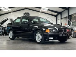 BMW SERIE 3 318i iS BERLINE E36 / 1ERE MAIN / HISTORIQUE