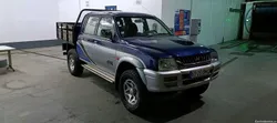 Mitsubishi L200 4x4 Strakar com ar condicionado