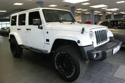 Jeep Wrangler UNLIMITED 2.8 CRD DPF AUT. SAHARA 200 CH 4X4 BVA - SELLERIE CUIR VOLANT EN