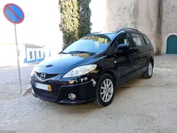 Mazda 5 7 lugares troco