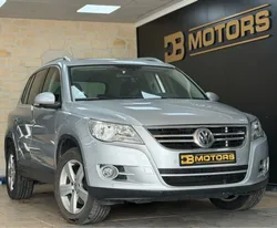 Garantie 12 mois Volkswagen Tiguan 2.0 TDI 140 ch Carat 4motion DSG7 / Toit ouvrant panoramique / Boîte automatique / Climatisation automatique Bi-zone / Sièges avant chauffants