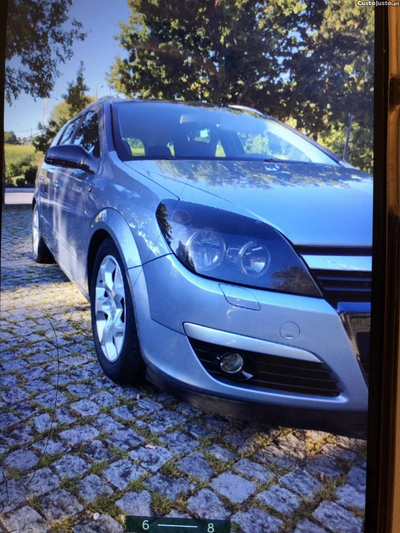 Opel Astra Com o